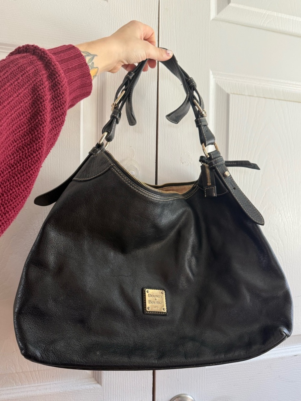 Dooney & Bourke Black Leather Shoulder Bag with Gold Plaque